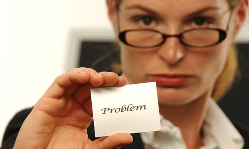 A woman showing a paper