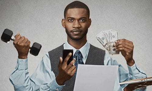 A person multi-tasking with multiple hands