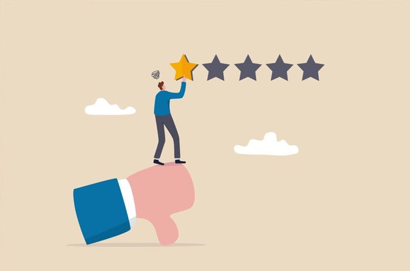 a man is holding a hand with five stars on it